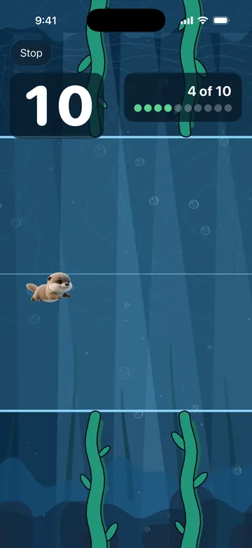 Mid-round: the otter swimming through a gap in the kelp, with the timer and gates cleared in the corner.